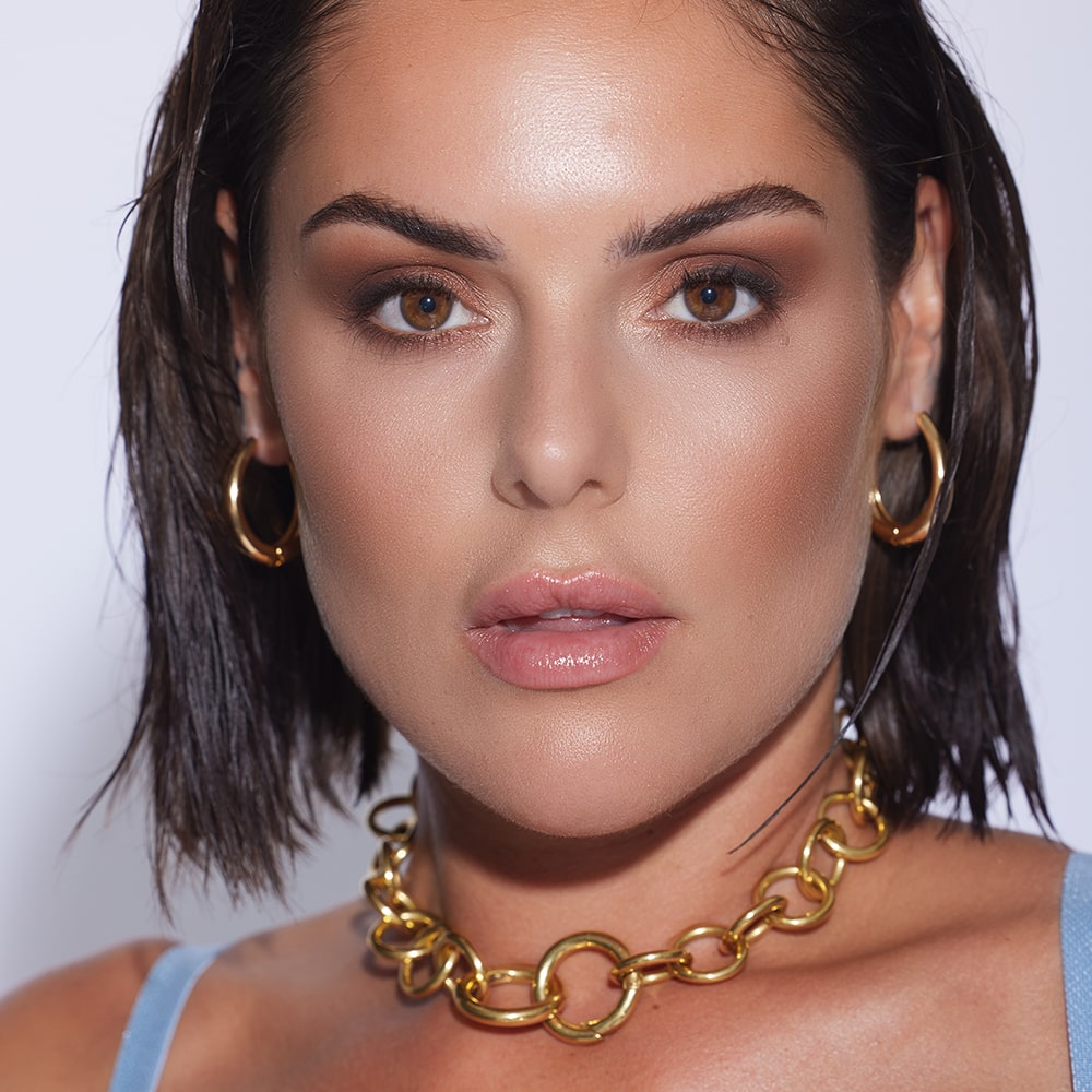 Effortless everyday styling. Just how we like it with out Lola Chubby Round Hoop Earrings.  Heavy enough to make a statement without weighing you down too much thanks to the hollow center, you can just wear one or more on eac