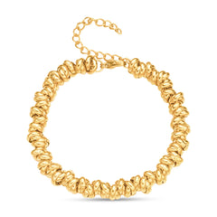 A delicate and sustainable 18k gold chain bracelet adorned with stacked gold rondelles to wear day to night.